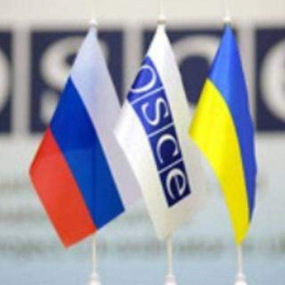 На засіданні ТКГ війну на Сході України назвали міжнародним збройним конфліктом